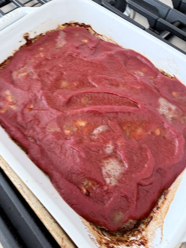 Casserole after baking the tomato layer.