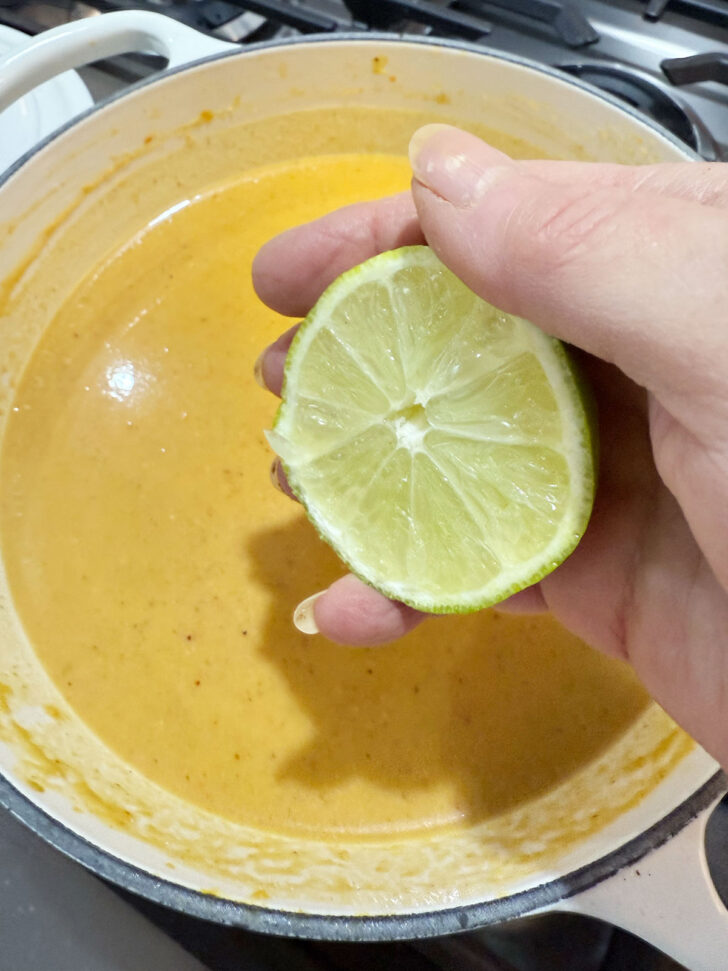 Finishing the sweet potato soup with lime juice.