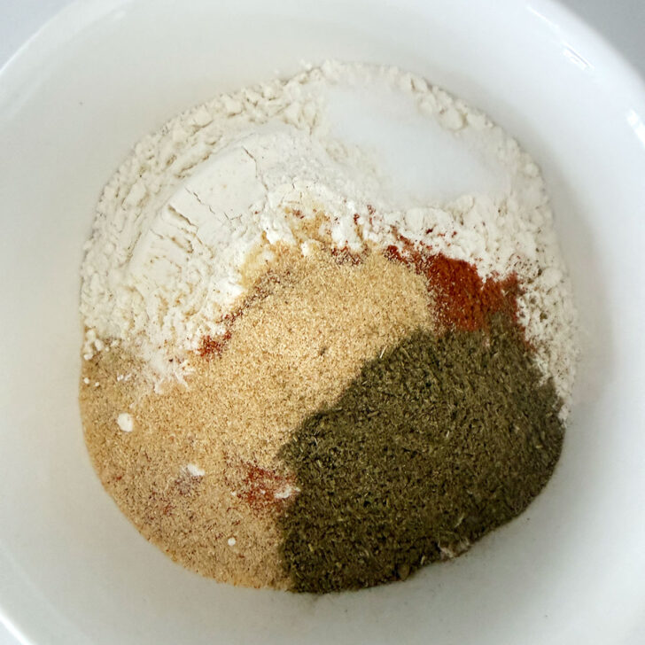 Homemade shake and bake ingredients in a small bowl.