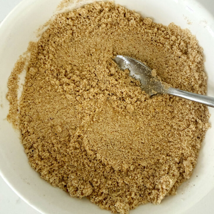 Homemade shake and bake after stirring in the oil.