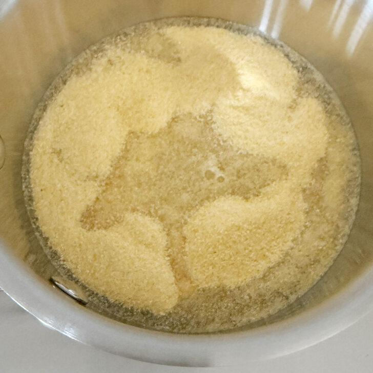 Cornmeal and water in a small saucepan.