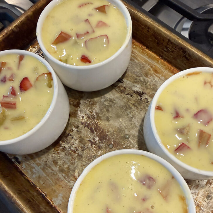 Custard topping spooned over the cake before they finish baking.