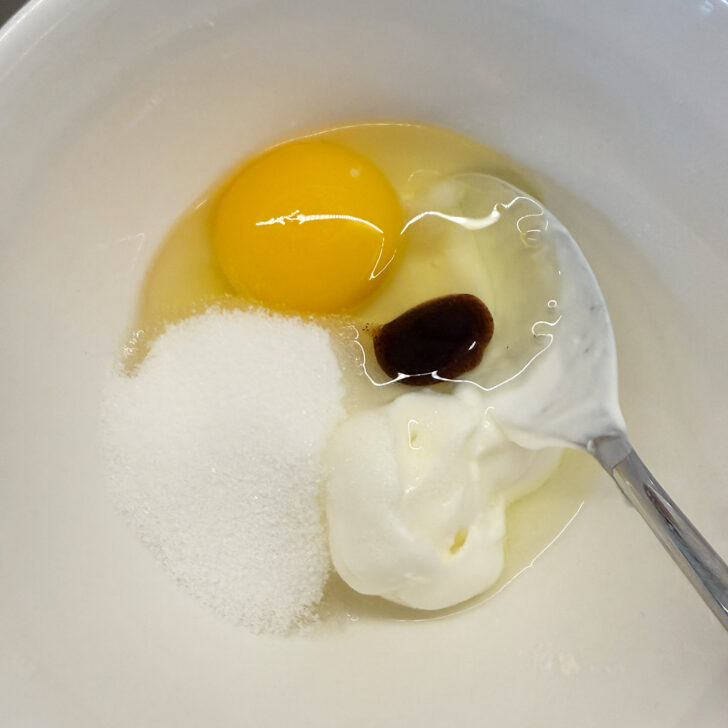 Custard topping ingredients in a small bowl.