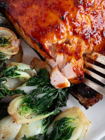 Hot honey salmon plated with bok choy.