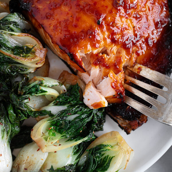 Hot honey salmon plated with bok choy.
