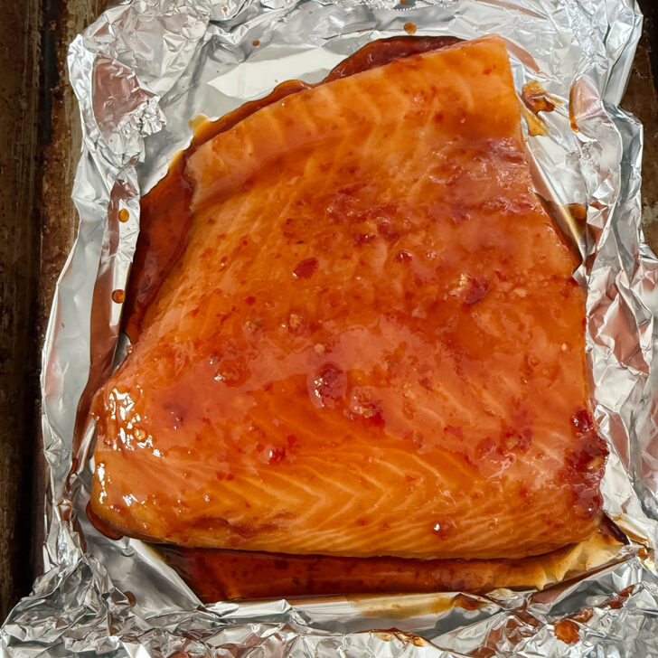 Hot honey glaze brushed onto the salmon.