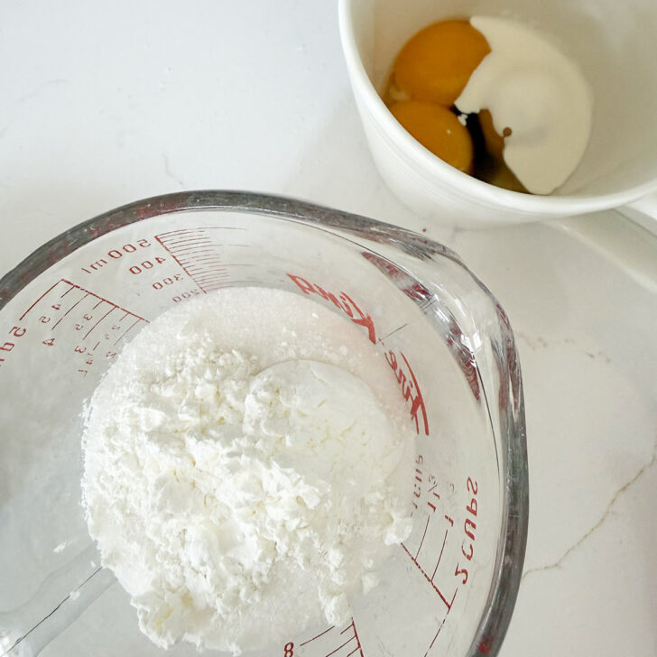 Rhubarb custard pie filling ingredients in two bowls.