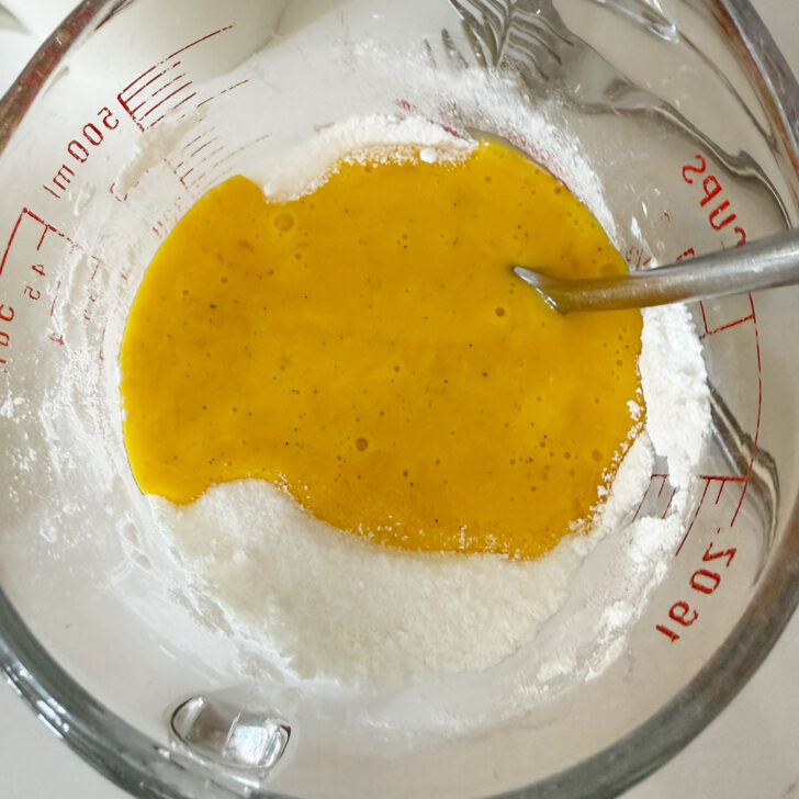 Wet and dry filling ingredients combined in a bowl.