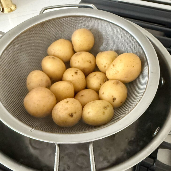 Mini potatoes in a steamer.