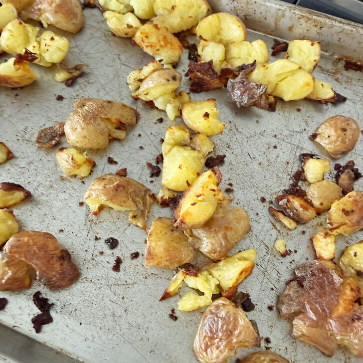 Potatoes on the baking sheet after roasting.