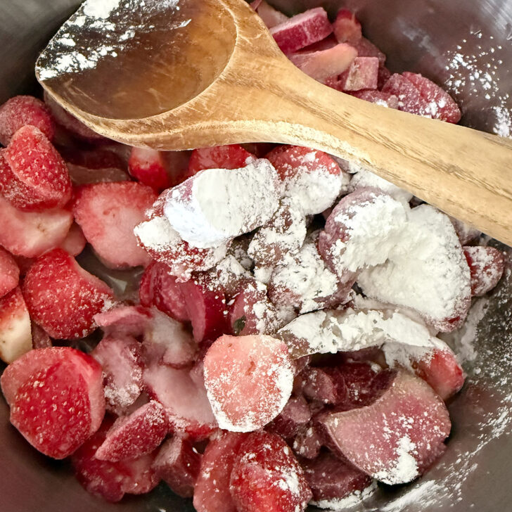 Strawberries and rhubarb  in a saucepan.