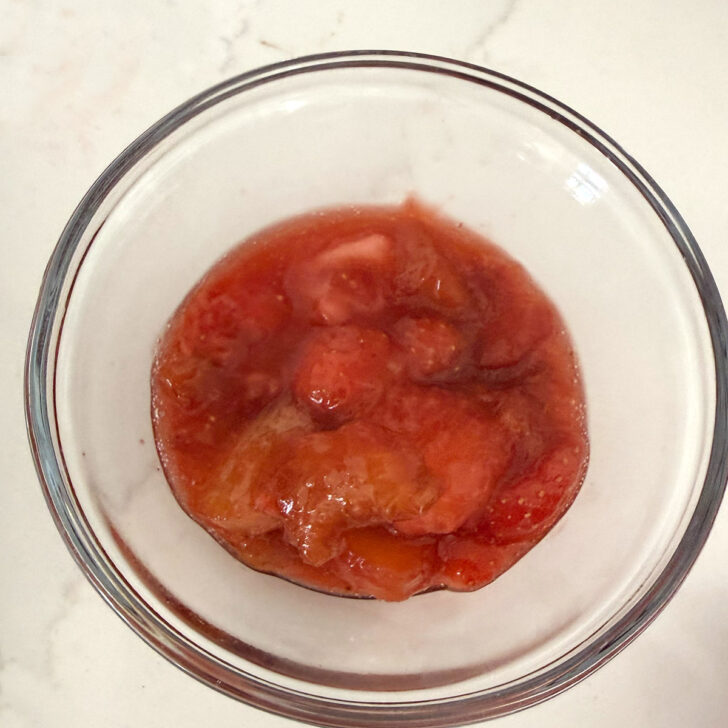 Setting aside some of the strawberry rhubarb mixture.