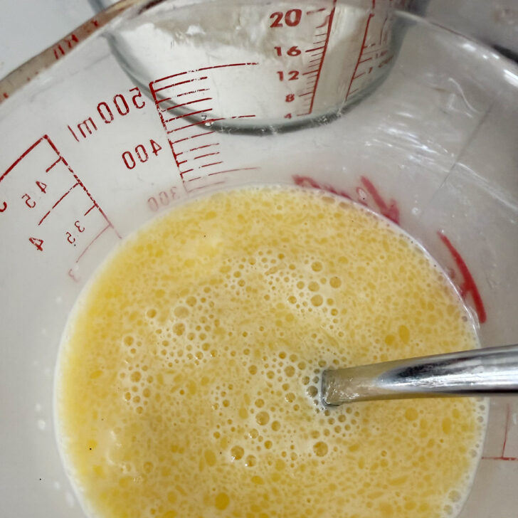 Preparing the wet and dry ingredients for the cake batter.