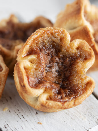 Classic Canadian butter tarts on a serving board.