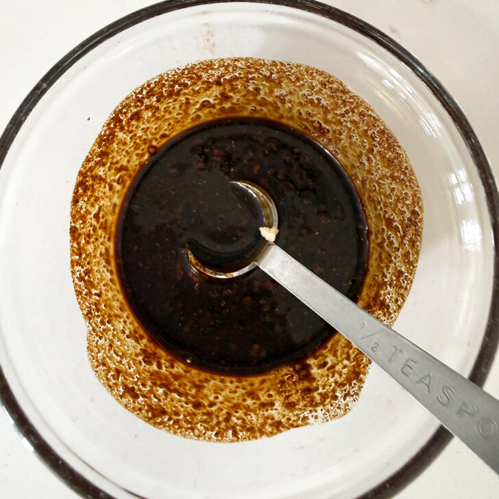 Chicken marinade mixed up in a small bowl.