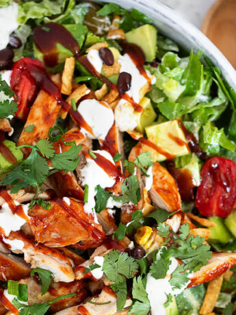 BBQ chicken dinner salad in a serving bowl.