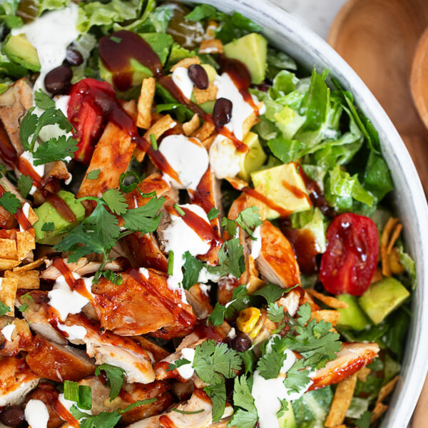 BBQ chicken dinner salad in a serving bowl.