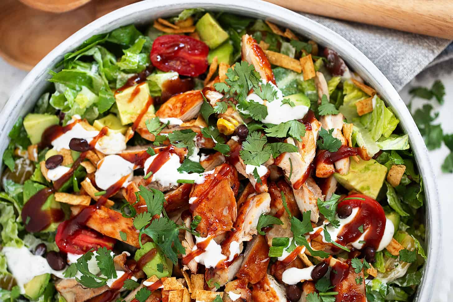 BBQ chicken dinner salad in a serving bowl.