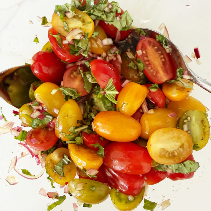 Cherry tomato topping after mixing together.