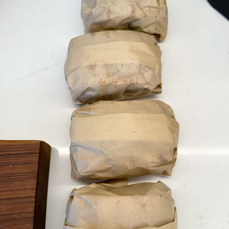 All flour sandwiches wrapped in parchment.