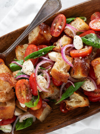Focaccia panzanella in a wooden salad bowl.