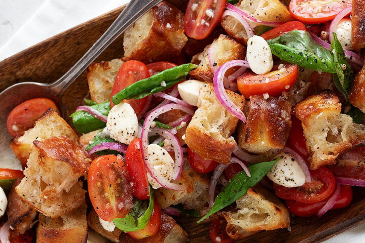 Focaccia panzanella in a wooden salad bowl.