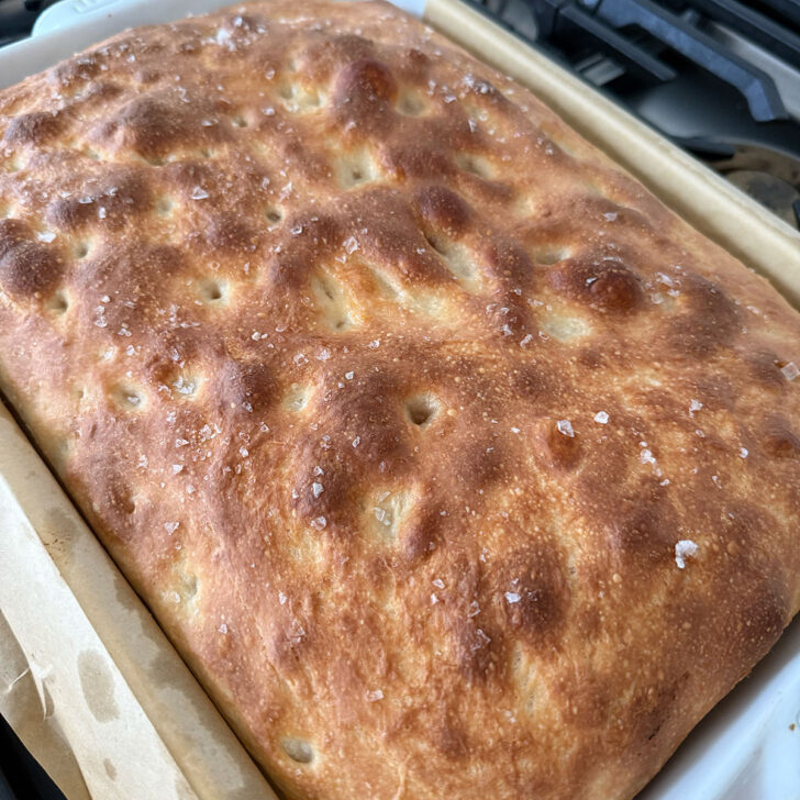 Overnight focaccia in the baking pan after baking.