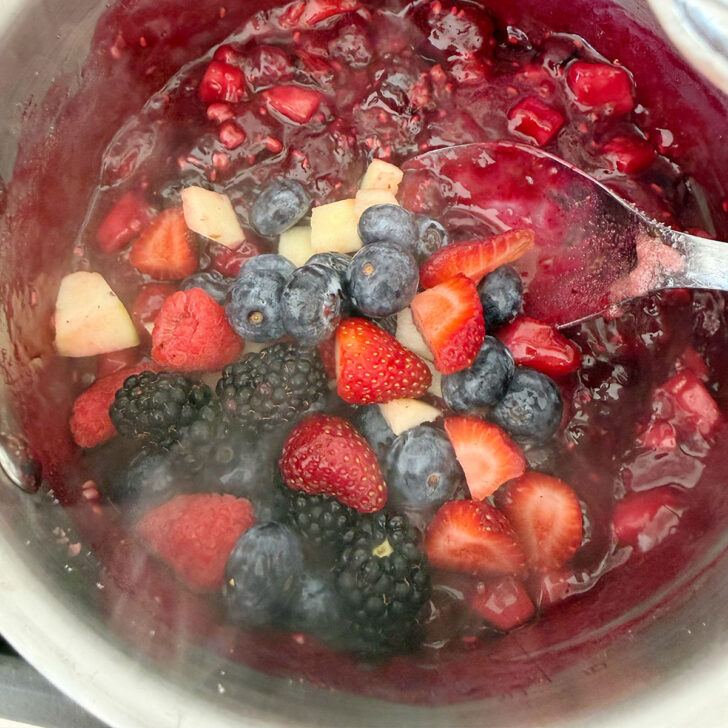 Reserved fresh fruit added to the cooked fruit.