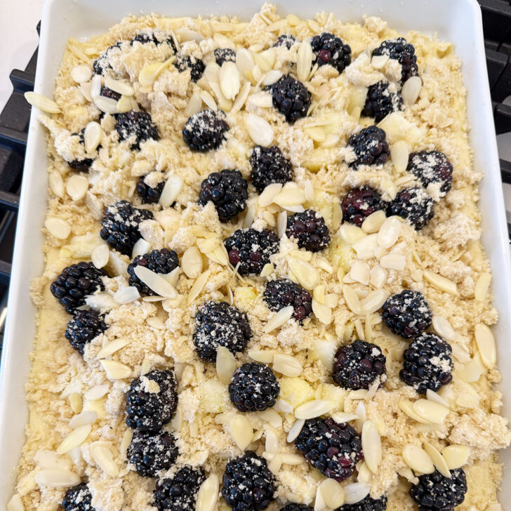 Crumb and almonds scattered over the kuchen before baking,