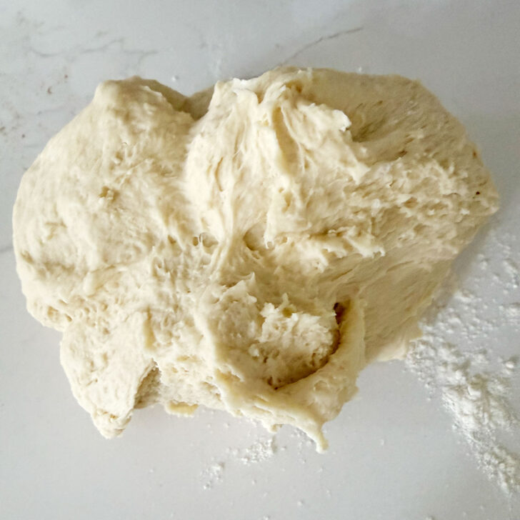 Finished dough on a floured counter.