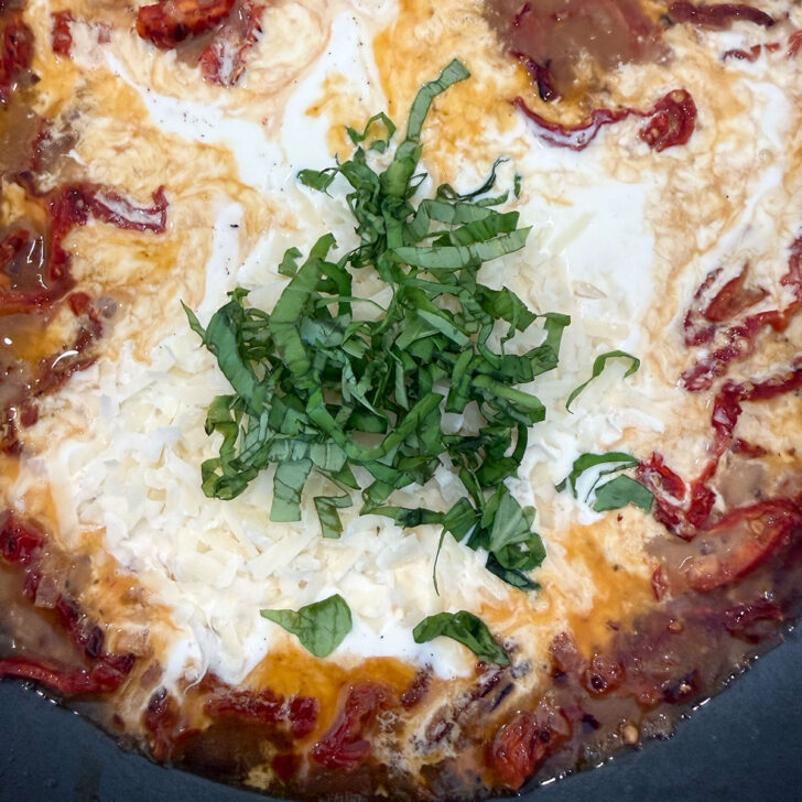 Cream and basil added to the skillet sauce.