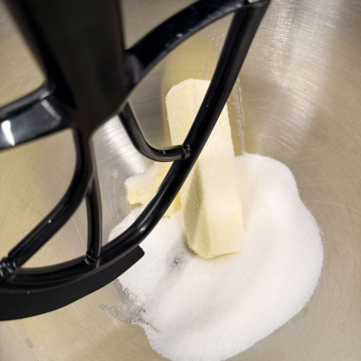 Butter and sugar in a stand mixer bowl.