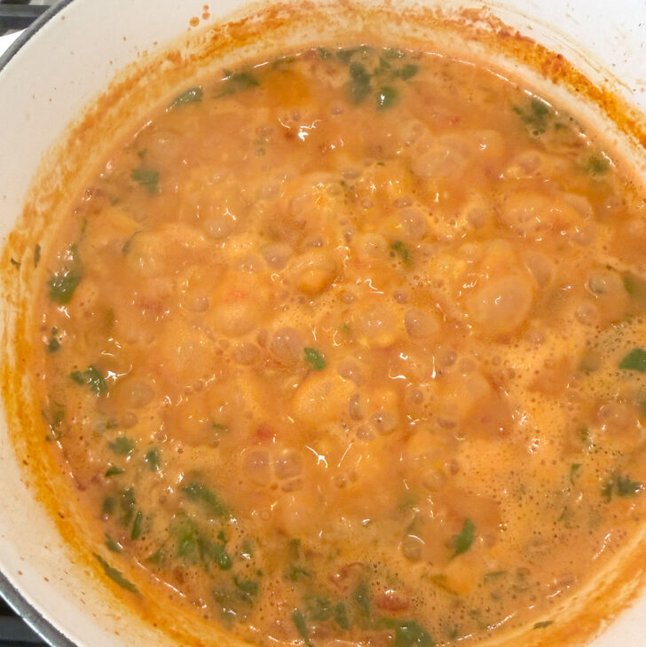 Simmering the lentil soup.