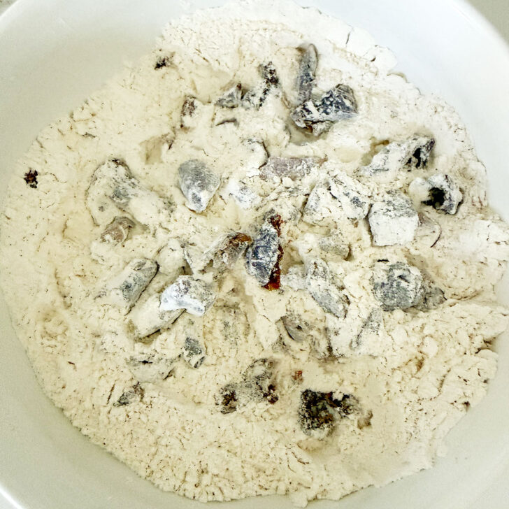 Mixing the dry ingredients together in a bowl.